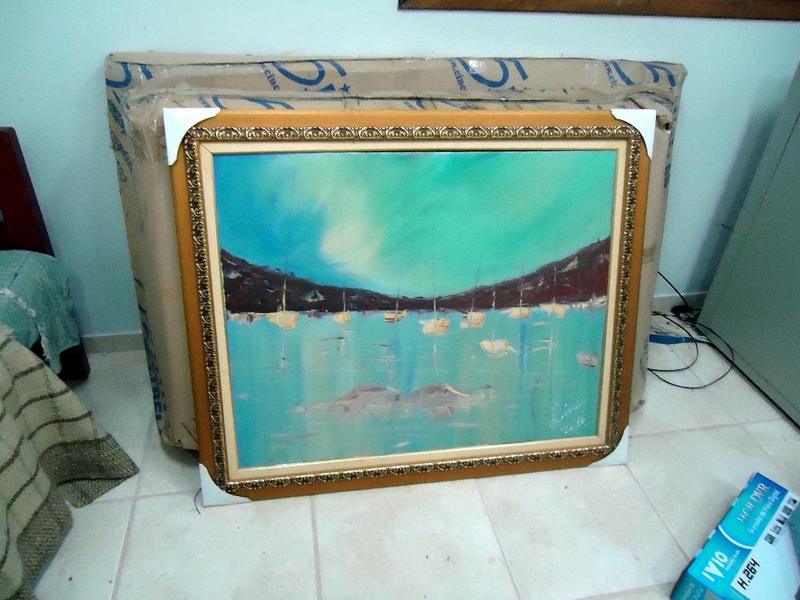 Figura 66 do Laudo 0392/2016 da Polícia Federal — Vista interna de um dormitório com destaque para o quadro e as embalagens com os monitores.